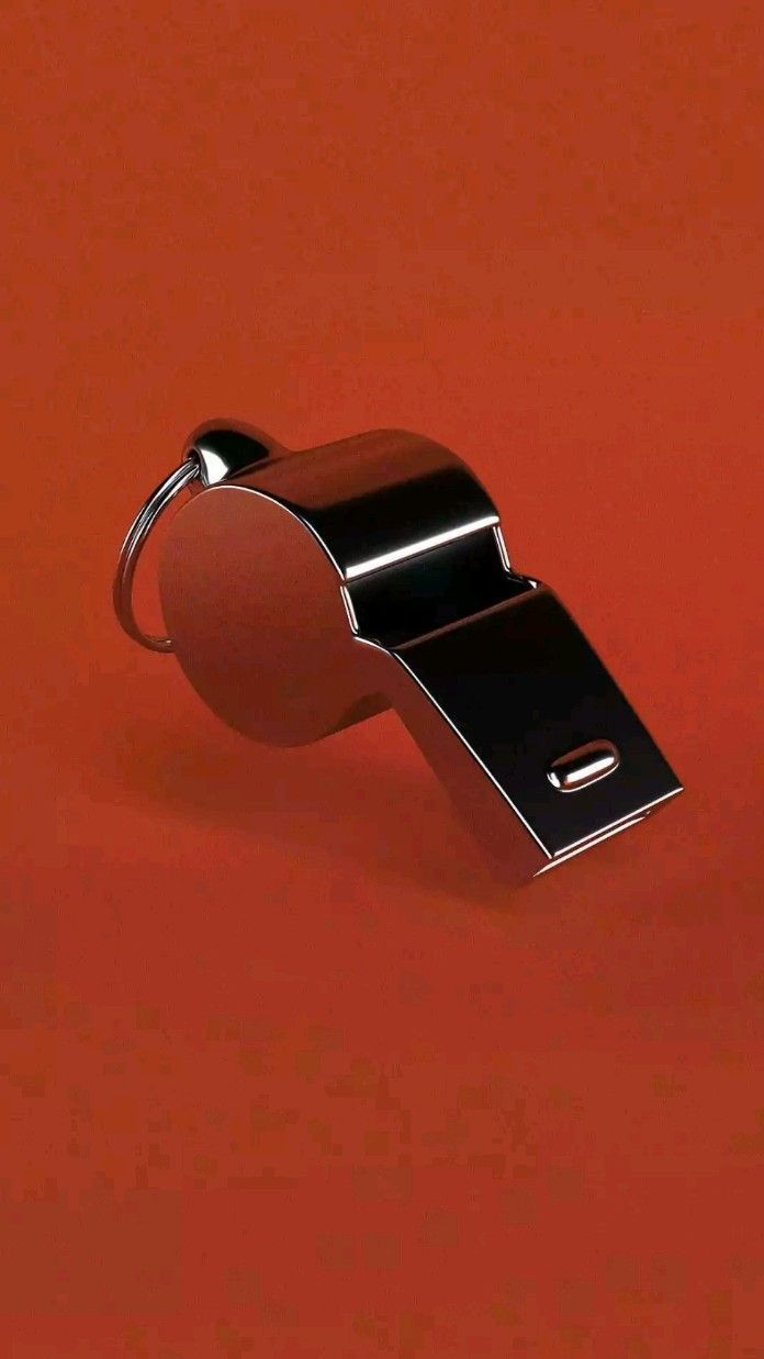 sifflet sur fond rouge